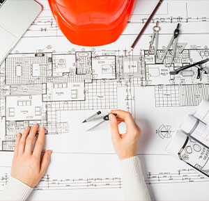 Architect working on building plans